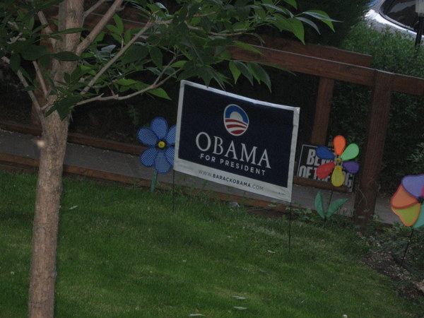 Obama sign by wheelchair ramp.